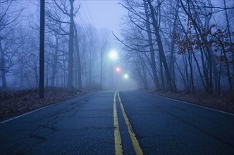 USA, New Jersey, Empty road at dawn