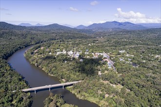 Australia, Queensland, Landscape with bridge and mountain range in background