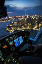USA, New York, New York City, City at night seen from helicopter