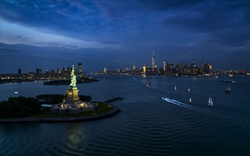 USA, New York, New York City, Statue of liberty at night