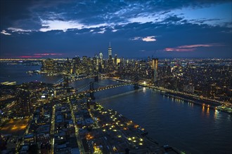 USA, New York, New York City, City lights at dusk