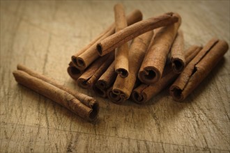 Cinnamon sticks on wooden table