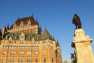 Canada, Quebec, Quebec City, Old architecture with statue