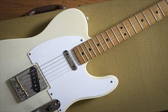 Fender Telecaster lying on guitar case