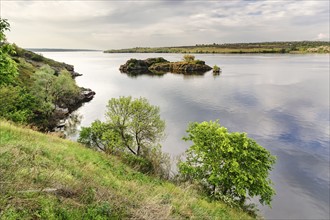 Ukraine, Dnepropetrovsk Region, Dnepropetrovsk District, Voloske, Rocky island on lake