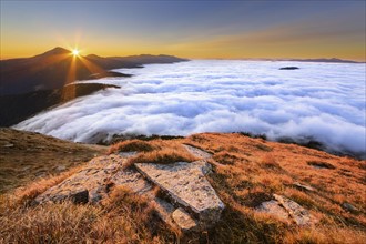 Ukraine, Zakarpattia region, Rakhiv district, Carpathians, Chornohora, Mountain landscape with mountain Hoverla and mountain Petros in mist