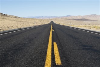 USA, Nevada, Highway 50, Clear sky over empty road