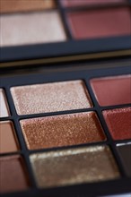 Close up of palette of brown eyeshadows