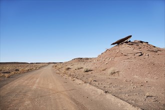 USA, Arizona, Empty road through desert landscape