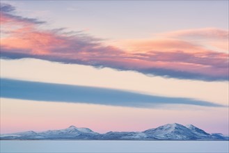 USA, Oregon, Alford Desert, Winter Sunset over mountains