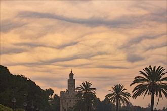 Spain, Seville, Torre del Oro, Unusual cloud formation at dawn