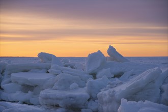 USA, Massachusetts, Eastham, Cape Cod, Frozen sea at dusk