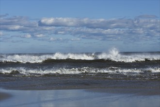 Waves splashing onto beach