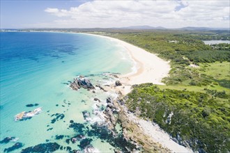 Australia, New South Wales, Bermagui, Landscape with forest and beach