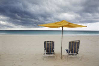Chairs and umbrella on beach