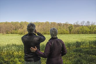 Mature couple in field