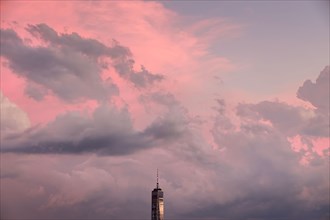 Freedom Tower against sky at sunset in New York City, USA