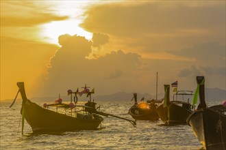 Boats at sunset in West Railay, Thailand
