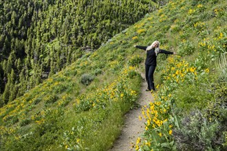 Woman on trail in Sun Valley, Idaho, USA