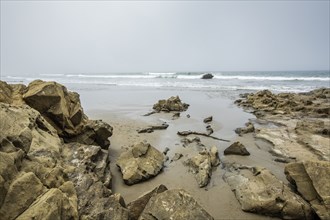 Rocks on beach in Morro Bay, California, USA