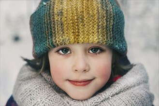 Girl in woollen hat during winter