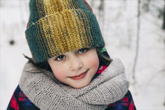 Girl in woollen hat during winter