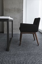 Black chair by desk