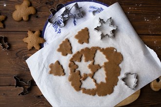 Cookie dough with cut out shapes