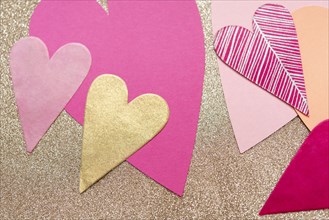 Pink and gold paper hearts