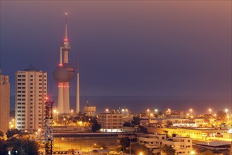 Skyline with Kuwait Towers at night in Kuwait City, Kuwait