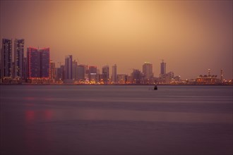 Skyline at sunset in Manama, Bahrain