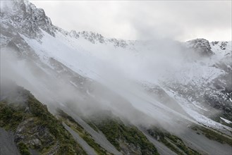 Low cloud over mountains in Mount Cook National Park, New Zealand