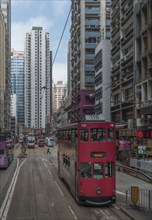 Double-decker tram on street in Hong Kong, China