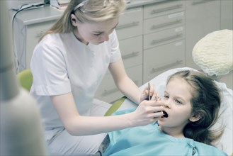 Girl during dentist examination