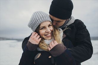 Young couple wearing warm clothing