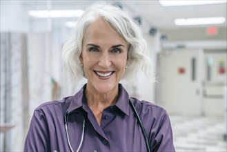 Portrait of smiling doctor with stethoscope