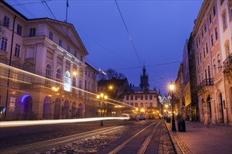 Light trails on street at night in Lviv, Ukraine
