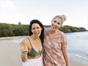Smiling women on beach