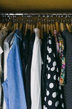 Clothes in wardrobe