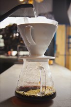 Water being poured into filter coffee
