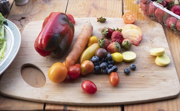 Fruit and vegetables on cutting board