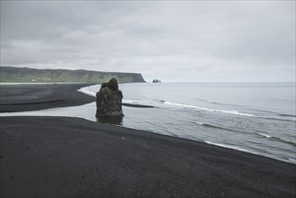 Rock formation on  beach in Vik, Iceland