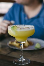 Margarita with lime garnish