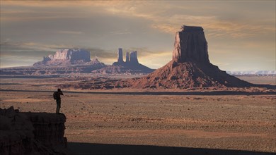 Silhouette of man photographing Monument Valley Navajo Tribal Park, USA