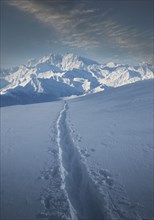 Tracks through snow by Monte Rosa in Piedmont, Italy