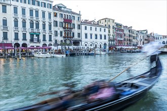 Blurred gondola on Grand Cana in Venice, Italy