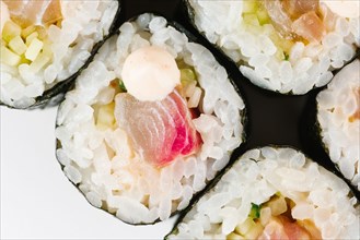 Sushi with raw fish and mayonnaise