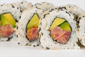 Sushi with raw fish and avocado