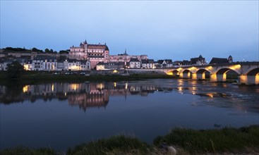 Amboise town by river at sunset in Loire Valley, France