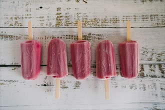Row of berry ice pops
